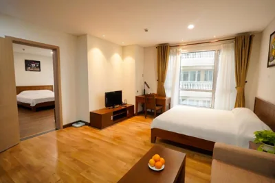 Habitación comunicada — Lancaster Ho Chi Minh Serviced Apartment Official